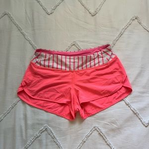 Pink Lululemon athletic shorts